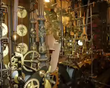 P1020897 Brass clock mechanism. Brass is self-lubricating and thus the mechanism requires no oil.