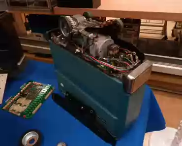 P1280843 Teledoc, an automated document and small parcel delivery system, uses 7km of rails and 450 small carriers, serves 140 stations across all buildings.