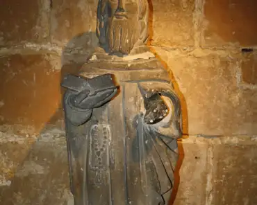34 St Anthony and his pig, Brittany, 15-17th century.