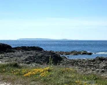 P1060241 Cape of La Hague with Alderney island 16 km away.