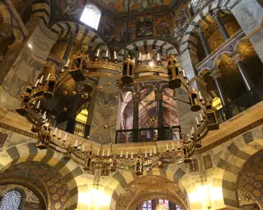IMG_8673 Carolingian octagon / Palatine chapel. The bronze rails were cast in the late 8th century. The 4m-wide "Barbarossa chandelier" was made in 1165-1170, was...