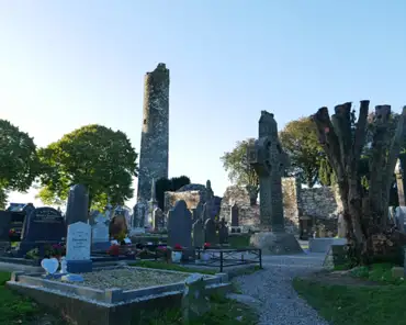 P1200176 Monasterboice is one of the oldest of Ireland's monastic sites. The monastery was founded in the 6th century by a local cleric named Buithe (Boice) mac Bronaig...