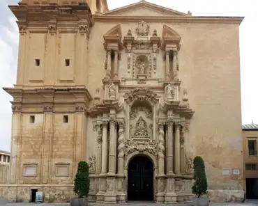 IMG_5557_stitch Front of the church, by Nicolas de Bussy, Valencian baroque style. Completed in 1682. The bottom alcove depicts the assumption of Mary, with Saint Peter and...