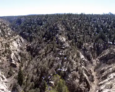 007 Walnut Canyon sits on the southern tip of the Colorado Plateau. The uplift of the plateau helped give water the energy to carve the canyon. Gravity, assisted by...