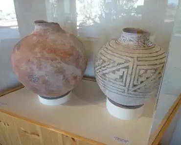 P1060727 Left: Deadman's fugitive red olla, ca. AD 700-1175. Right: Sosi Black-on-white olla, ca. AD 1075-1200. The undecorated pot with the reddish coloration is from a...