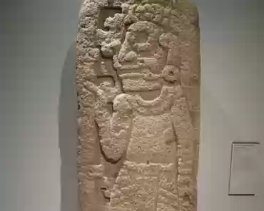 P1070434 Panel with a figure holding a staff and a bag, Mexico, Veracruz, volcanic stone, 500-700 AD.