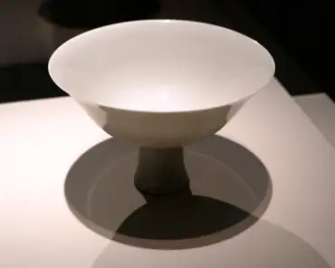 P1100199 Sweet-white-glazed stem bowl with hidden decoration, China, Jiangxi province, Ming dynasty, probably 1403-1412.