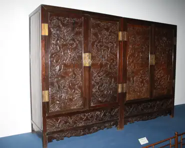 img_8381 Qing furniture (1644-1911): square corner cabinet with engraved cloud and dragon design.