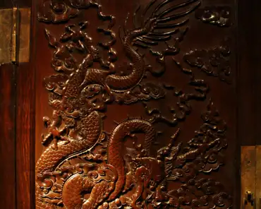 img_8383 Qing furniture (1644-1911): square corner cabinet with engraved cloud and dragon design (detail).