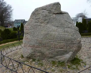 02 The larger runic stone was erected by Harald Bluetooth and records the christianization of Denmark: "Harald king made this memorial stone for Gorm his father...