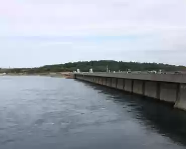 09 A road was built on top of the power plant such that the plant simply looks like a regular dam. A lock was also built to allow boats to navigate between the...