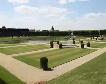 20150711-133627 The water garden is of classical inspiration and is organized around a large Louis XV mirror-shaped pond. The garden is surrounded by a cloister of lime trees.