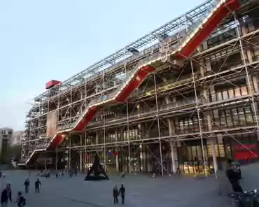 P1020205 Pompidou center. The large red and transparent pipe outside the buildings contains a series of mechanical stairs.