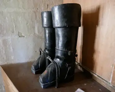 P1020232 Seven league boots, 2 to 4kg each, used by the postman who travelled 7 leagues (30 km) between 2 stations. The boots were made of leather, wood and nails on the...