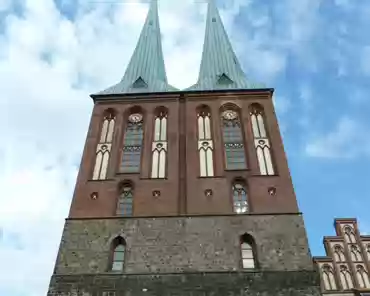 P1180539 Nikolai Kirche, built in 1230, is one of the oldest building in Berlin with Saint Mary's church . The base of the tower is romanesque. The towers and the inner...