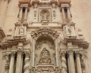 IMG_5556 Front of the church, by Nicolas de Bussy, Valencian baroque style. Completed in 1682. The bottom alcove depicts the assumption of Mary, with Saint Peter and...