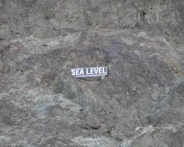 06 The basin is more than 280m below see level. The sea level sign is high up a cliff.