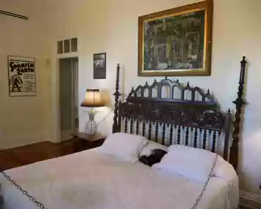 P1050786 Bedroom. The bedhead used to be a Spanish monastery portal (16th century).