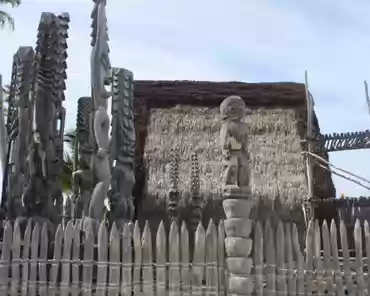 20140213-221500 Hale o keawe: ki'i (wooden images) stand watch over the rebuilt temple and mausoleum that once held the bones of 23 ali'i (noble chiefs). Ho'okupu (offerings)...