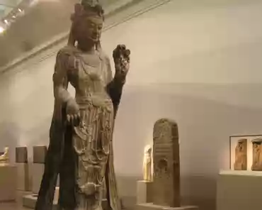 11 Guanyin (Bodhisattva of compassion), China, ca. 580AD, grey limestone + polychrome
